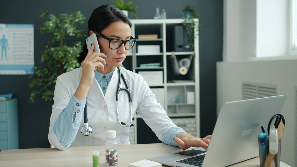 Infographic showing the three domains of the certified medical administrative assistant exam: Foundational Knowledge (20%), Administrative Procedures (50%), and Healthcare Regulations (30%) with sample topics under each.